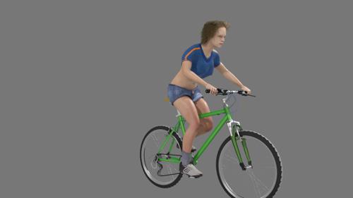 Coralie rides a bike preview image